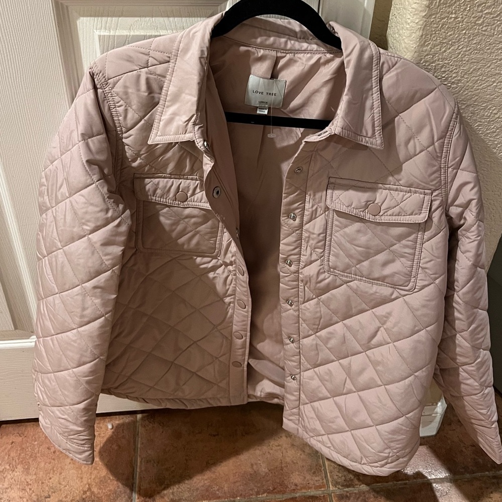This is a purple button up jacket